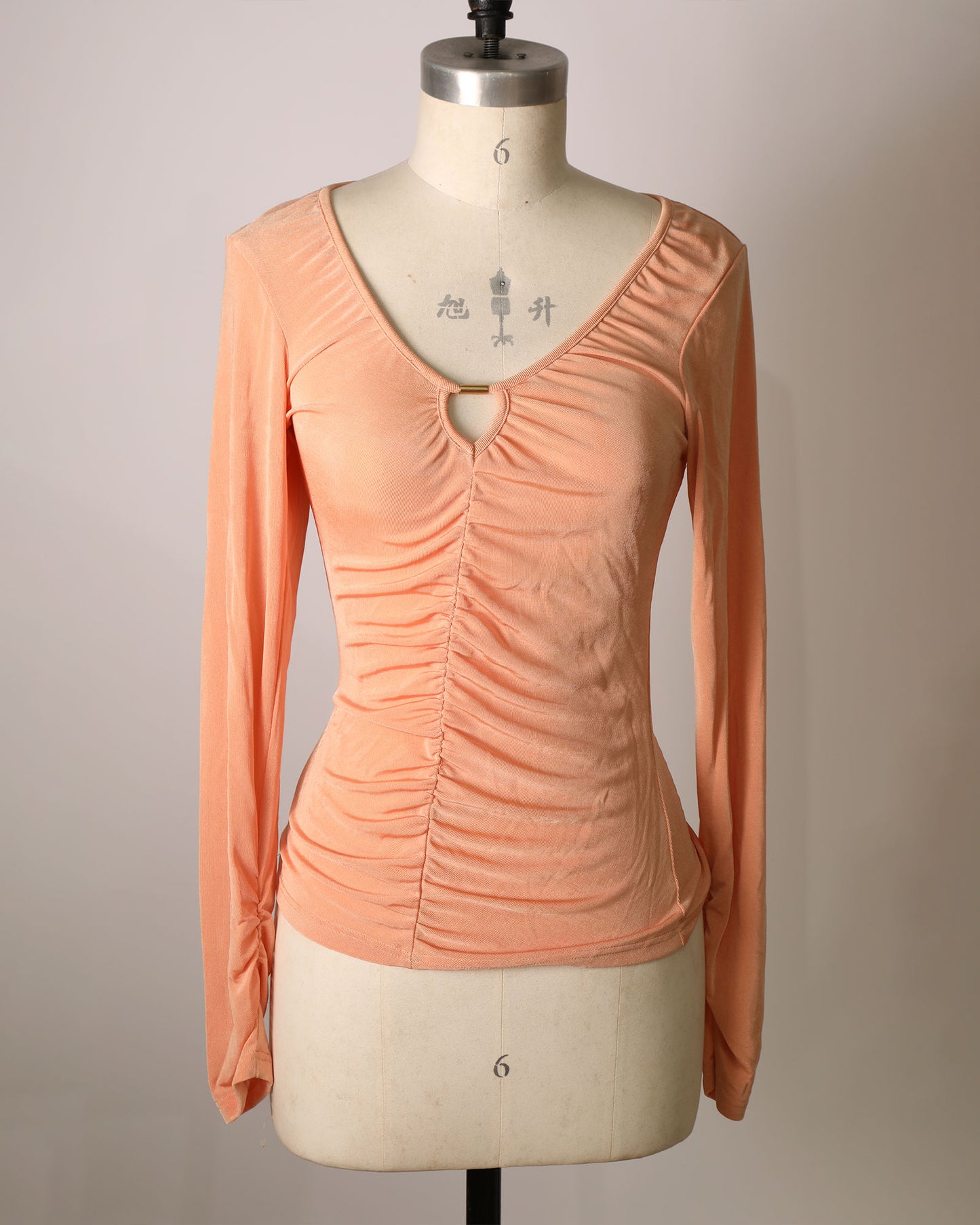 Long Sleeve Ruched Front Top with Cut-Out Detailing - Peach