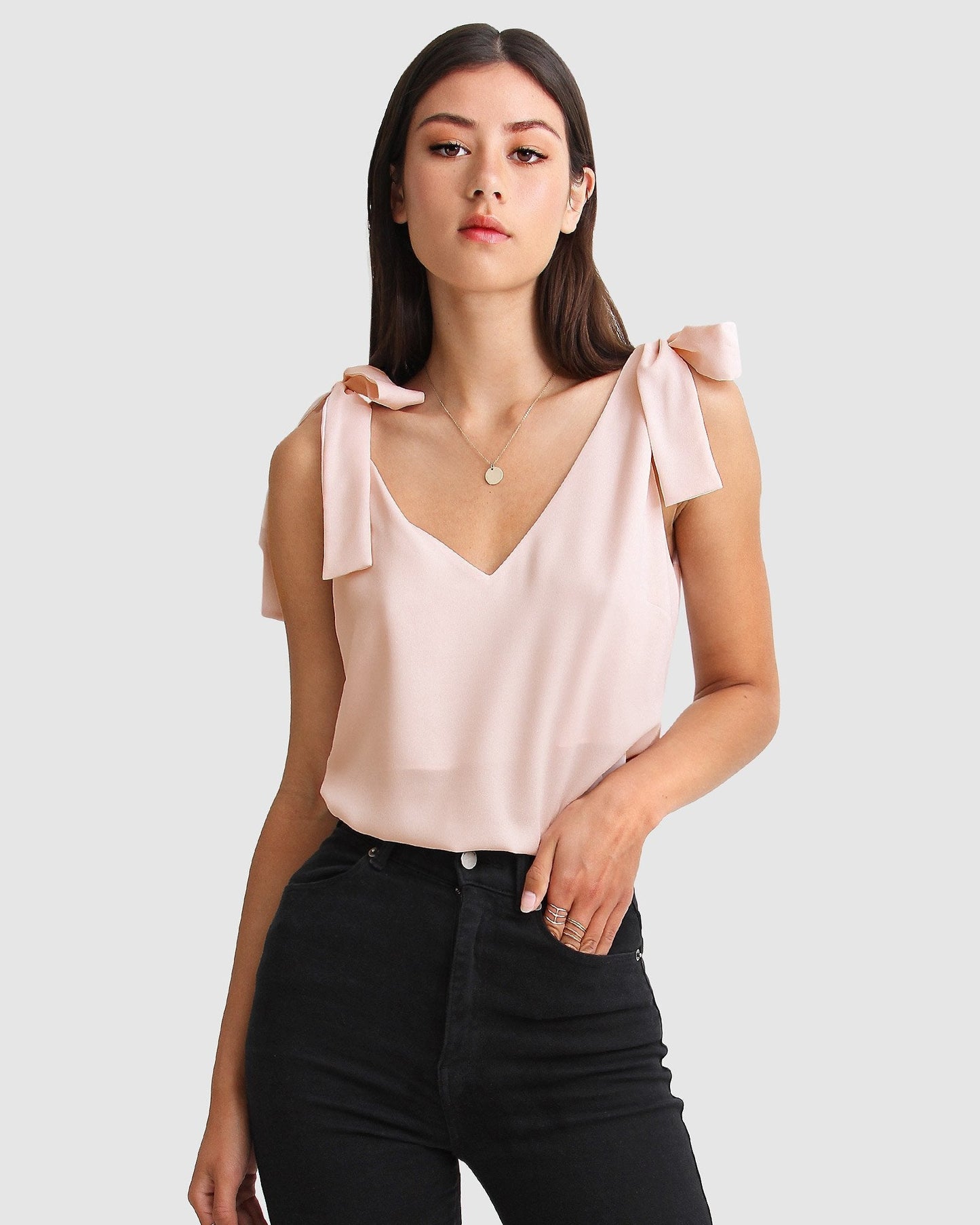 fell-for-you-blush-V-neck-top-front-2_fb85e79e-02ae-4293-a1e6-0fa8b6263219.jpg