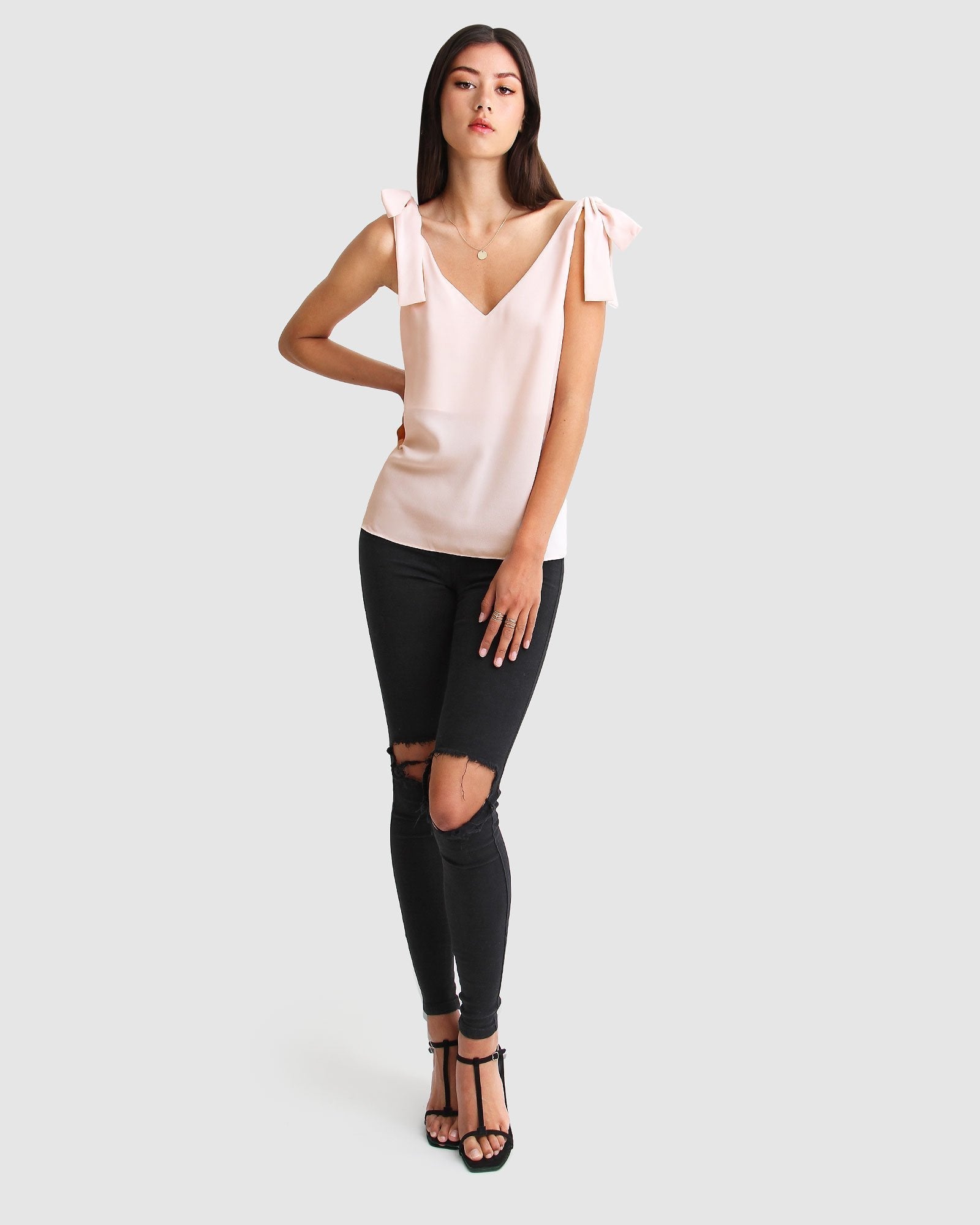 fell-for-you-blush-V-neck-top-full-body_b4b3c2bb-e7ad-4101-9998-850396bab16b.jpg