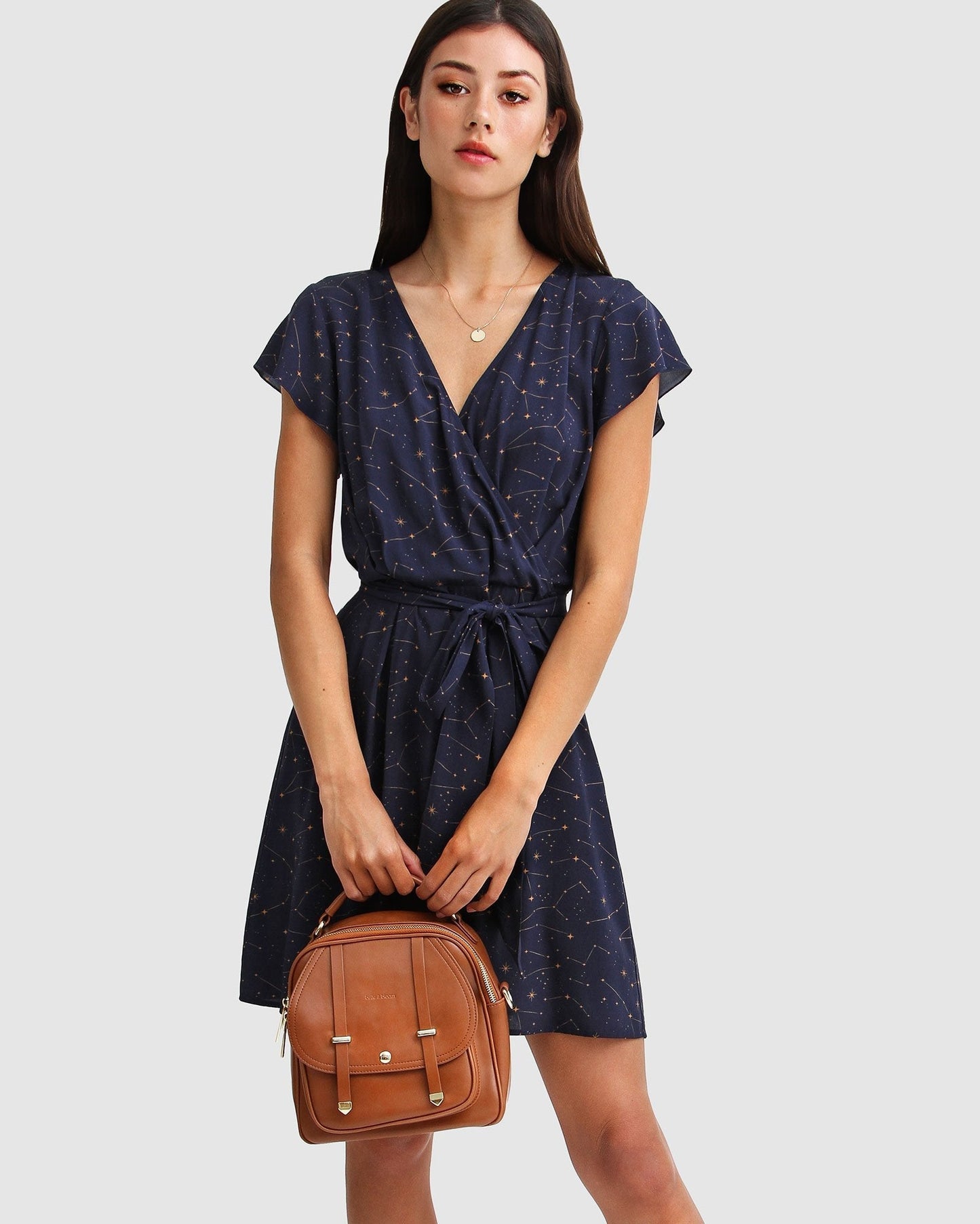 i_m-the-star-navy-wrap-dress-backpack_5a7bf7cb-0882-4d5b-a4f7-10acb0d7561a.jpg