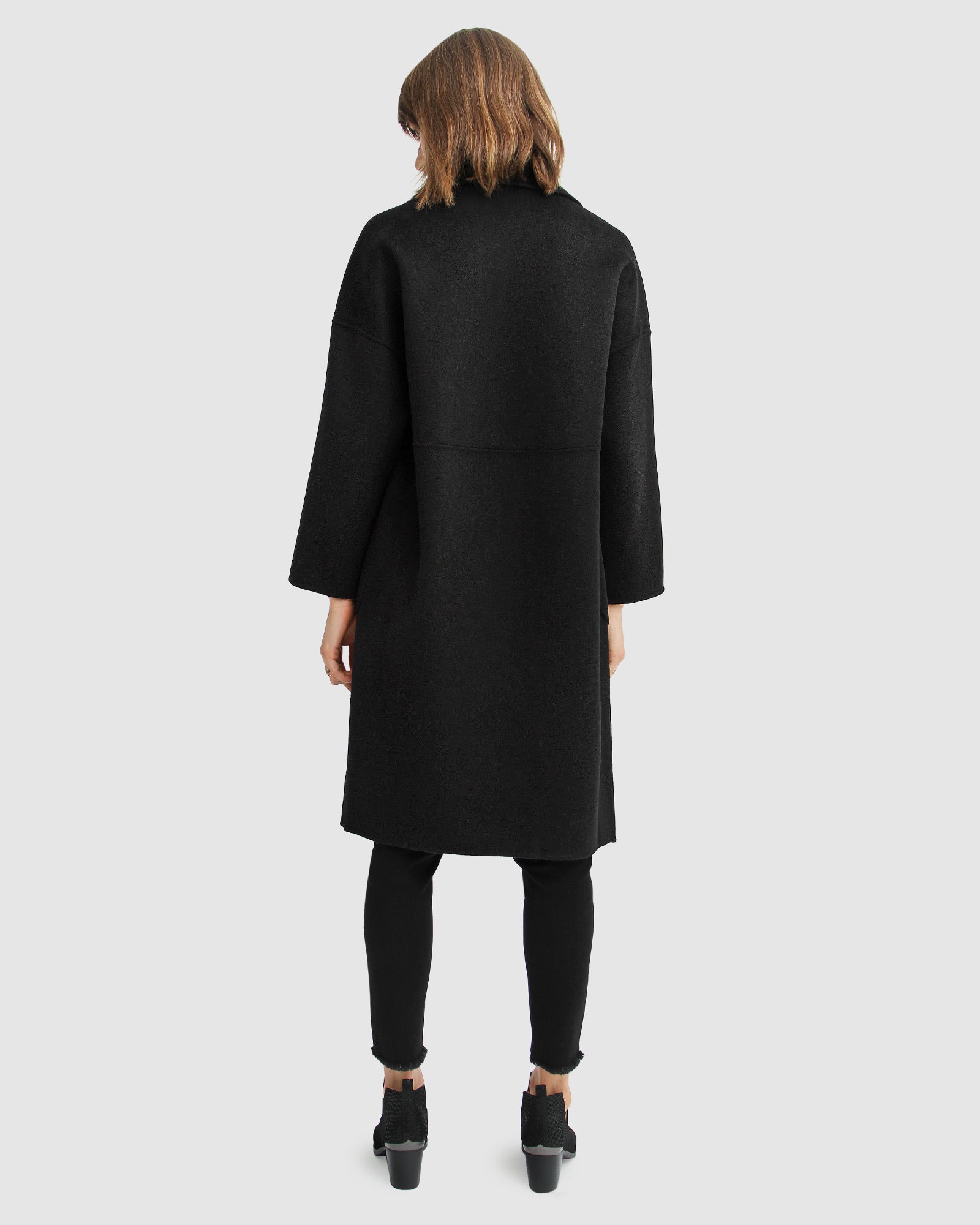 publisher-black-double-breasted-wool-blend-coat-back_fe5fad52-87f8-45d3-8b41-39d8a81e2707.jpg